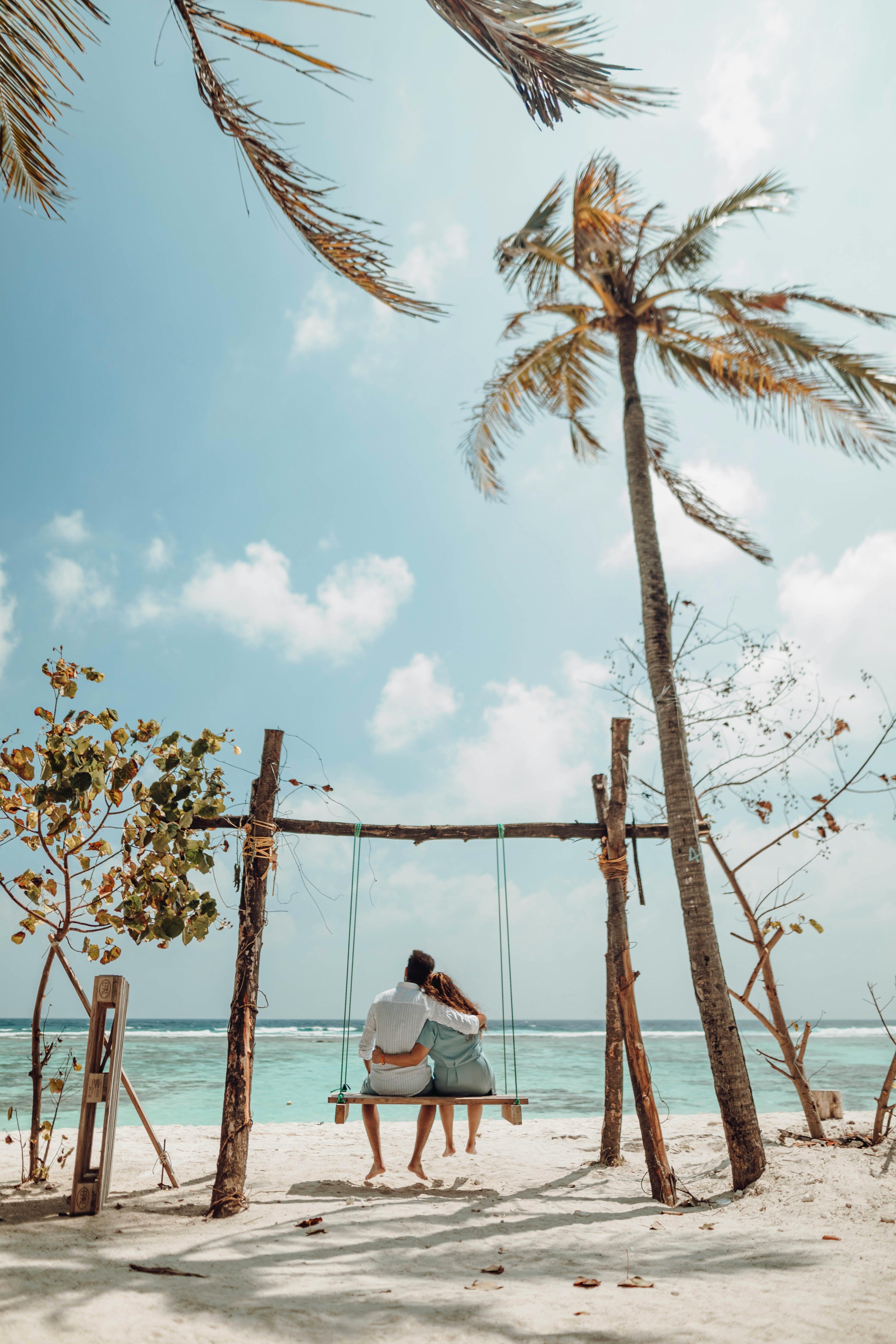 Couple enjoying a honeymoon safari sunset